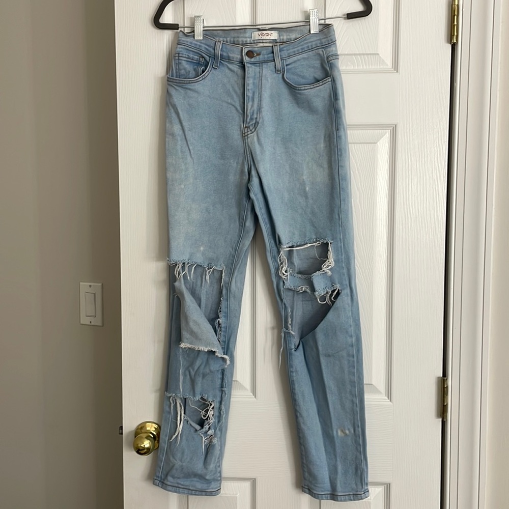 Vibrant MIU Jeans. Ripped blue jeans. High rise. US 5